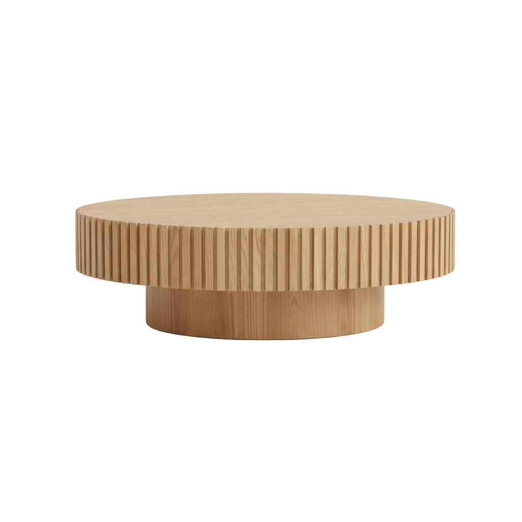 modern drum style coffee table arranged in living room beside sectional seating