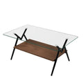 transparent rectangular coffee table arranged inside contemporary living room furniture setup